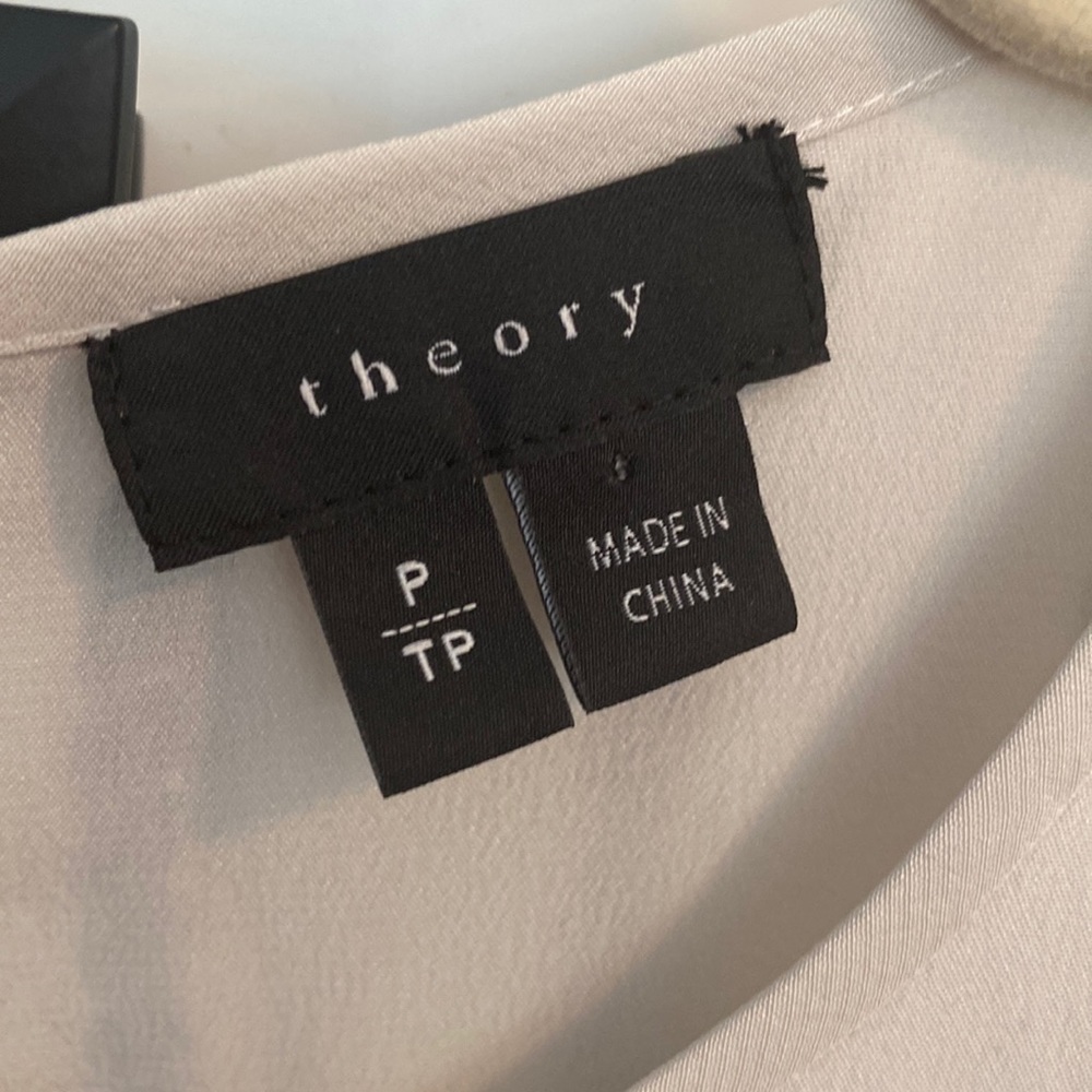 Theory silk blouse tank. Flirty layered design for slight swing.